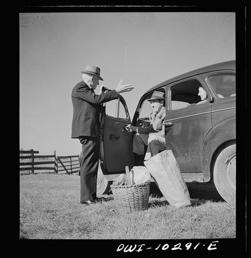 Untitled photo, possibly related to: Montgomery County, Maryland. Farmers sharing a car on market day