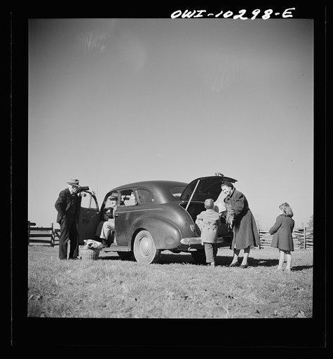 Untitled photo, possibly related to: Montgomery County, Maryland. Farmers sharing a car on market day