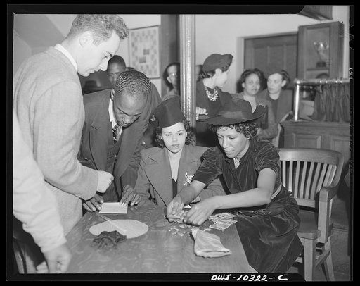Washington, D.C. Two members of the United Federal Workers of America, Congress of Industrial Organizations, collecting offerings made by the audience at the mass meeting of the citizens' committee