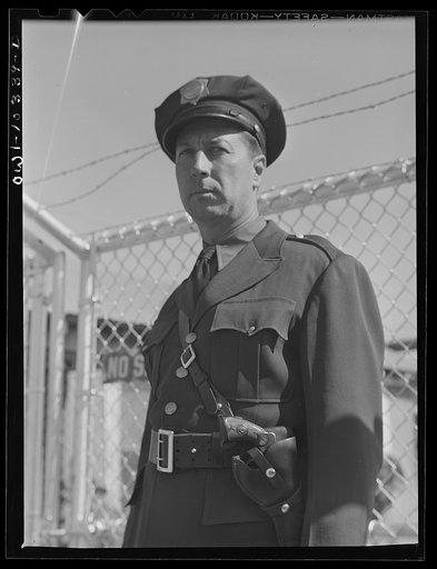 Guard at the entrance to the Phillips gasoline plant