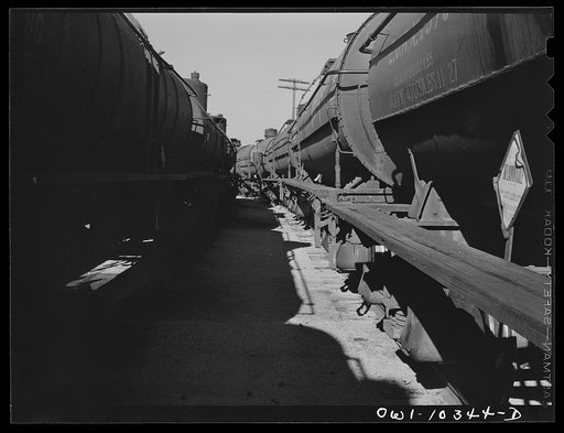 Untitled photo, possibly related to: Tank cars at a gasoline plant loading rack
