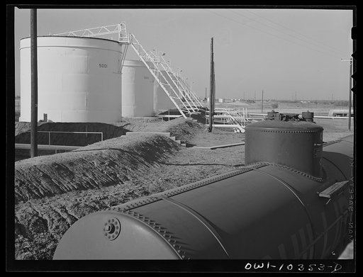 Tank car and storage tanks at the Phillips gasoline plant