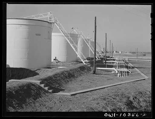 Storage tanks at a gasoline plant loading truck