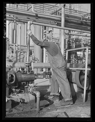 Untitled photo, possibly related to: Chief repairman at the Phillips gasoline plant