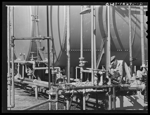 Untitled photo, possibly related to: Storage tanks at a gasoline plant