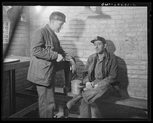 Untitled photo, possibly related to: Pittsburgh, Pennsylvania (vicinity). Montour no. 4 mine of the Pittsburgh Coal Company. Fire boss signing the record which shows that he has inspected all working places in his section, before the entry of the men and once after work has started
