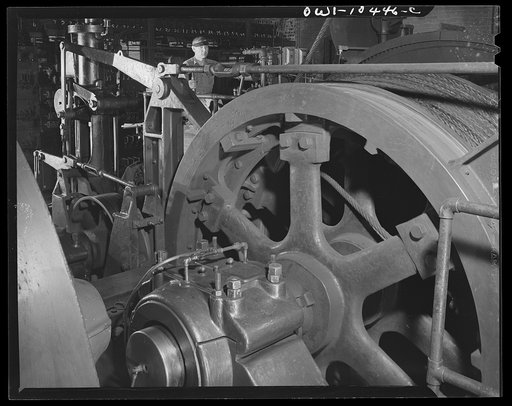 Pittsburgh, Pennsylvania (vicinity). Montour no. 4 mine of the Pittsburgh Coal Company. Electrically driven hoist which lifts the cages of coal cars from the floor of the mine to the tipple where a rotary dump empties them into waiting railroad cars railroad car below