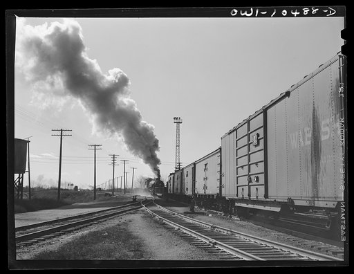 Chicago, Illinois. Engine pulling train out of a classification yard to a departure yard