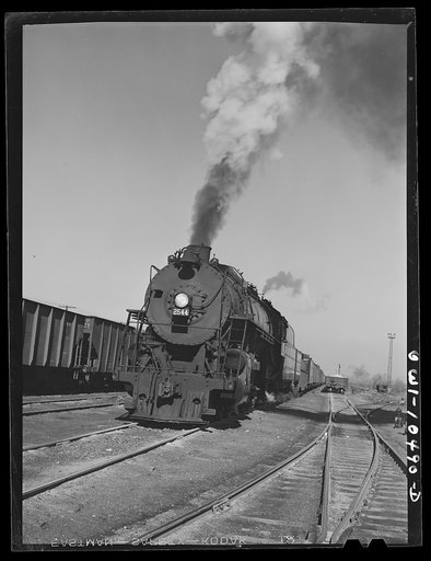 Untitled photo, possibly related to: Chicago, Illinois. Switch engine which has just pushed its last car over the hump at an Illinois Central Railroad yard
