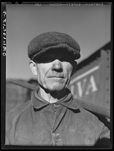Chicago, Illinois. Rylko Groka, a Ukrainian by birth, working on the car repair tracks at an Illinois Central Railroad yard