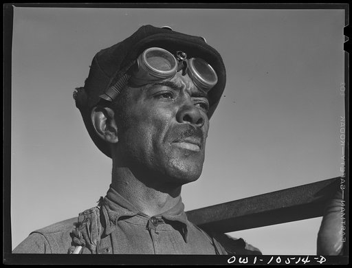 Chicago, Illinois. Frank Williams, working on the car repair tracks at an Illinois Central Railroad yard. Mr. Williams came to Chicago from Pocahontas, Mississippi. He has eight children, two of whom are in the United States Army