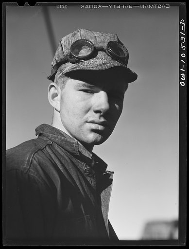 Chicago, Illinois. Harry Van der Schilden, a signal maintenance helper at an Illinois Central Railroad yard