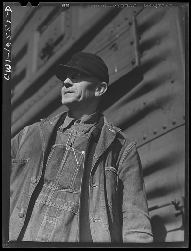Chicago, Illinois. E. A. Morgan of Harvey, Illinois, freight conductor in an Illinois Central Railroad yard