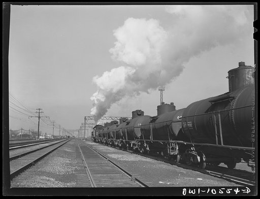 Untitled photo, possibly related to: Chicago, Illinois. An oil train just arrived from the southwest at an Illinois Central Railroad yard