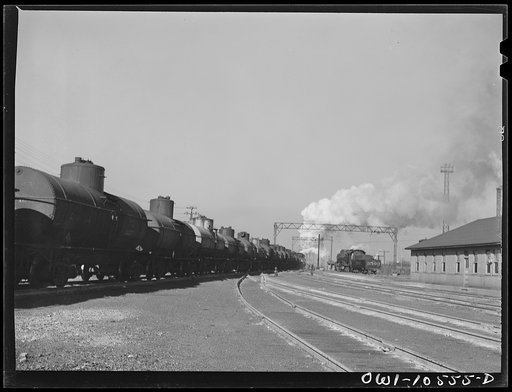 Untitled photo, possibly related to: Chicago, Illinois. An oil train just arrived from the southwest at an Illinois Central Railroad yard