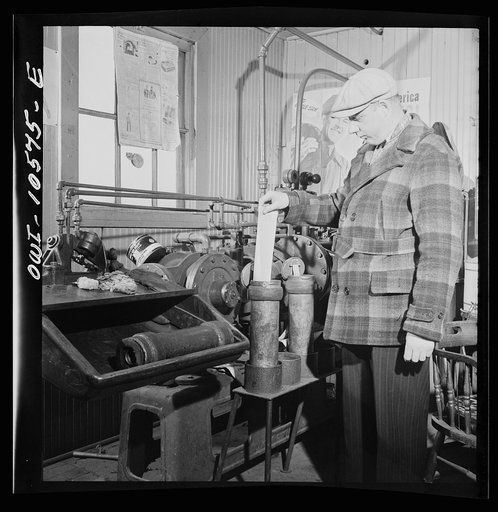 Untitled photo, possibly related to: Chicago, Illinois. These pneumatic tubes in the Illinois Central Railroad yardmaster's office connect him with the general office