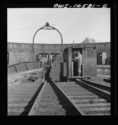 Untitled photo, possibly related to: Chicago, Illinois. The turntable at the roundhouse at an Illinois Central Railroad yard
