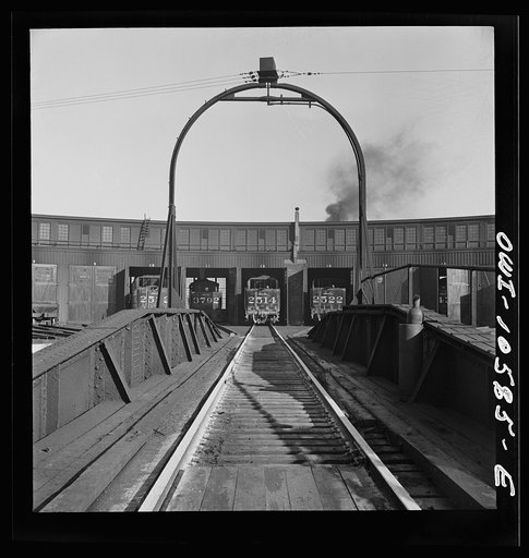 Untitled photo, possibly related to: Chicago, Illinois. The turntable at the roundhouse at an Illinois Central Railroad yard