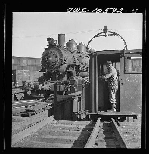 Chicago, Illinois. A yard engine on the turntable at the roundhouse at an Illinois railroad yard