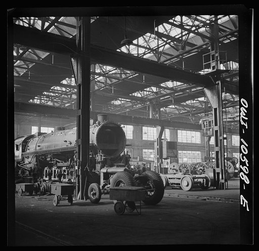 Chicago, Illinois. Locomotives in for repair at the roundhouse at an Illinois railroad yard