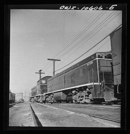 Chicago, Illinois. One of the giant diesel-electric locomotives at work at an Illinois Central Railroad yard