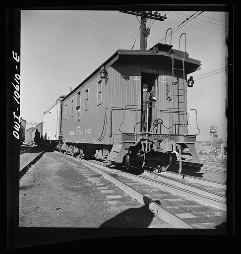 Chicago, Illinois. Freight train bound for New Orleans leaving an Illinois Central Railroad yard