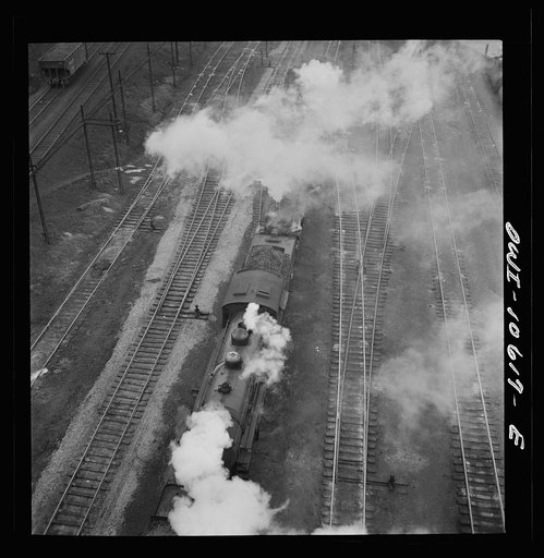 Untitled photo, possibly related to: Chicago, Illinois. Engines lined up at coaling station at an Illinois Central Railroad yard