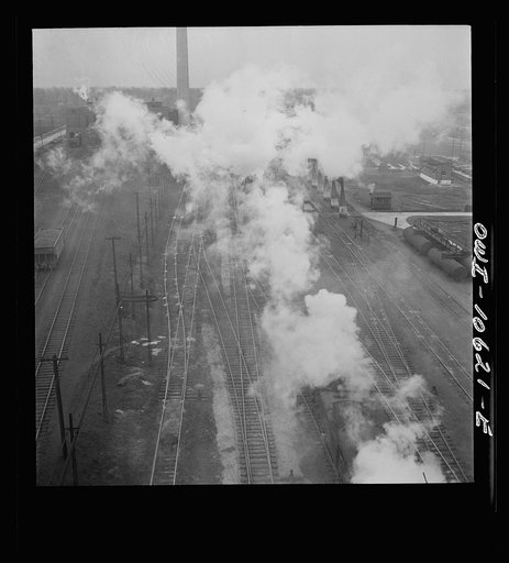 Untitled photo, possibly related to: Chicago, Illinois. Engines lined up at coaling station at an Illinois Central Railroad yard