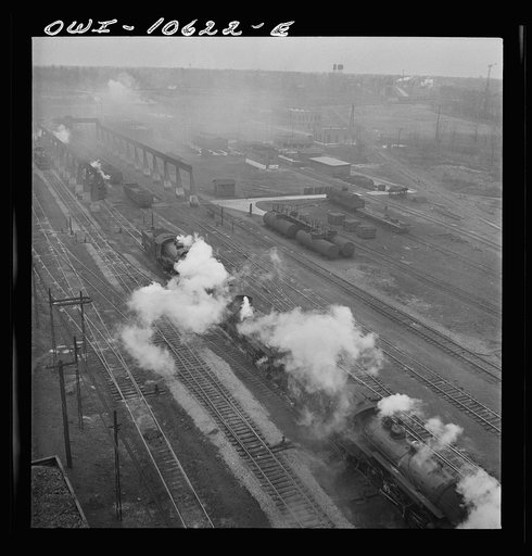Chicago, Illinois. Engines lined up at coaling station at an Illinois Central Railroad yard