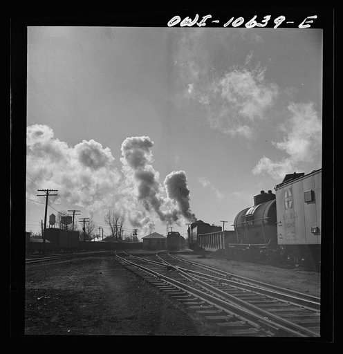Untitled photo, possibly related to: Chicago, Illinois. Southbound freight train leaving an Illinois Central Railroad yard