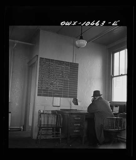 Chicago, Illinois. In the yardmaster's office at the south classification yard at an Illinois Central Railroad yard