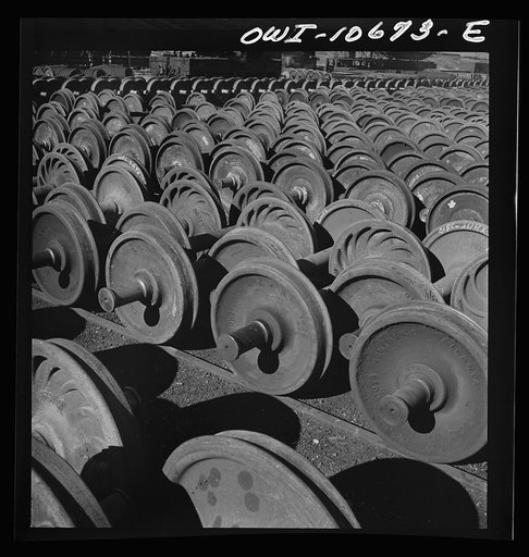 Chicago, Illinois. Wheels and axles outside the locomotive shops at an Illinois Central Railroad yard