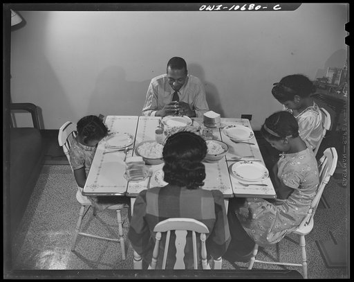 Untitled photo, possibly related to: Washington, D.C. Mr. Branch, resident of the James Creek dwellings, saying grace