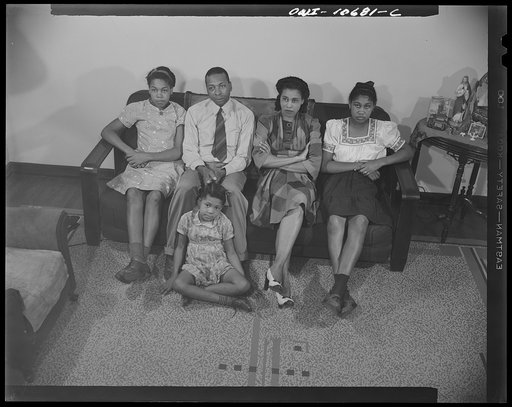 Untitled photo, possibly related to: Washington, D.C. Mr. Branch, his wife and three girls who live in the government housing project in the southwest section