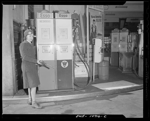 Untitled photo, possibly related to: New York, New York. Girl at the pump