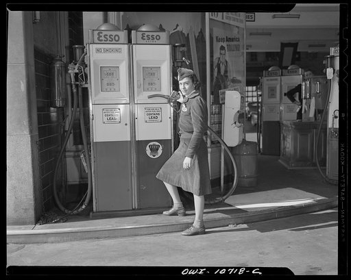 Untitled photo, possibly related to: New York, New York. Girl at the pump