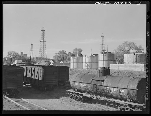 Untitled photo, possibly related to: Oklahoma City, Oklahoma. Oil wells adjoining railroad yards