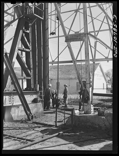 Untitled photo, possibly related to: Oklahoma City, Oklahoma. Oil field discovered about 1930. All the wells are now on the pump