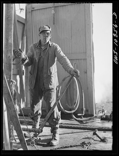 Moore County, Texas. Cable tool driller at work