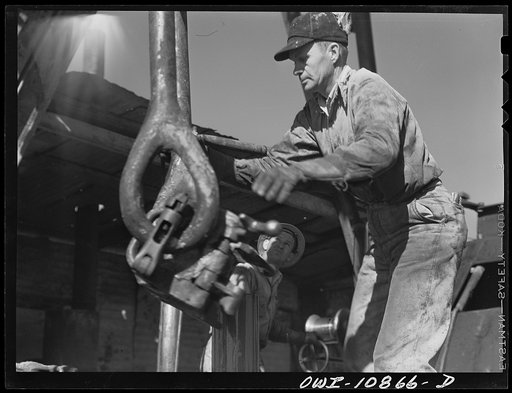 Untitled photo, possibly related to: Moore County, Texas. Cable tool driller at work