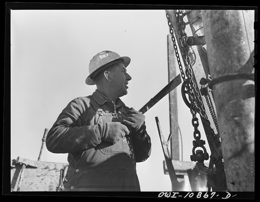 Moore County, Texas. Cable tool driller at work