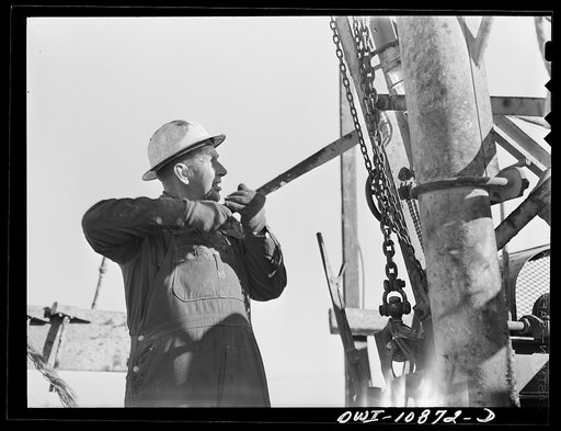 Untitled photo, possibly related to: Moore County, Texas. Cable tool driller at work