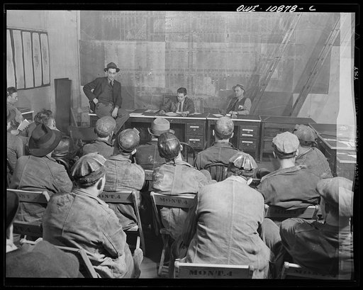 Pittsburgh, Pennsylvania (vicinity). Montour no. 4 mine of the Pittsburgh Coal Company. Meeting of mine foreman, in front of the map of the mine, to talk over increased production