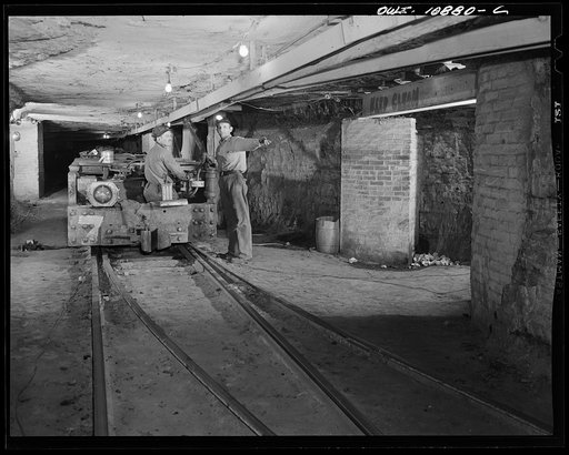Pittsburgh, Pennsylvania (vicinity). Montour no. 4 mine of the Pittsburgh Coal Company. Transportation dispatcher giving orders to an outgoing coal "trip" in front of the dispatcher's office in the mine