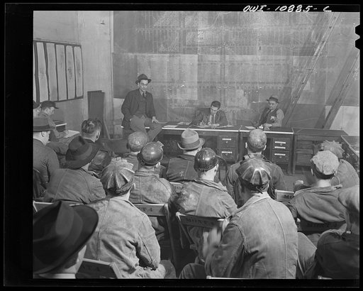 Untitled photo, possibly related to: Pittsburgh, Pennsylvania (vicinity). Montour no. 4 mine of the Pittsburgh Coal Company. Mine foreman at a production meeting