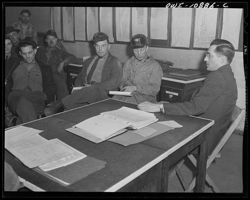 Untitled photo, possibly related to: Pittsburgh, Pennsylvania (vicinity). Montour no. 4 mine of the Pittsburgh Coal Company. Mine foreman at a production meeting