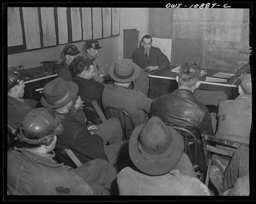 Untitled photo, possibly related to: Pittsburgh, Pennsylvania (vicinity). Montour no. 4 mine of the Pittsburgh Coal Company. Mine foreman at a production meeting
