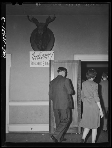 Untitled photo, possibly related to: Lancaster, Pennsylvania. Company dance given in Moose Hall by employees of the Hamilton Watch Company so that new employees might get acquainted. Extra girls chatting in the hall outside the dance floor