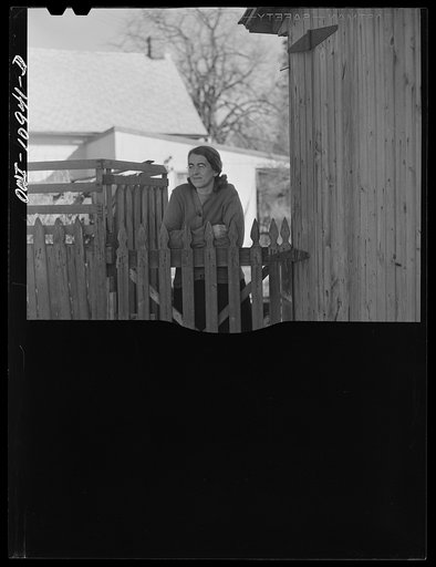 Manheim, Lancaster County, Pennsylvania. Woman at her back gate