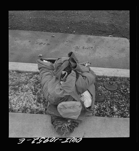 Lititz, Pennsylvania. Scrap collection drive. Each household placed its contribution on the sidewalk. It was picked up by local trucks whose owners had volunteered their services for civilian defense. Rug and old clothes for rag scrap
